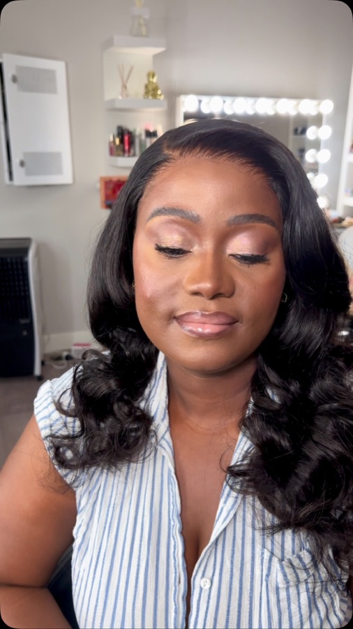 Soft glam makeup with a body wave wig