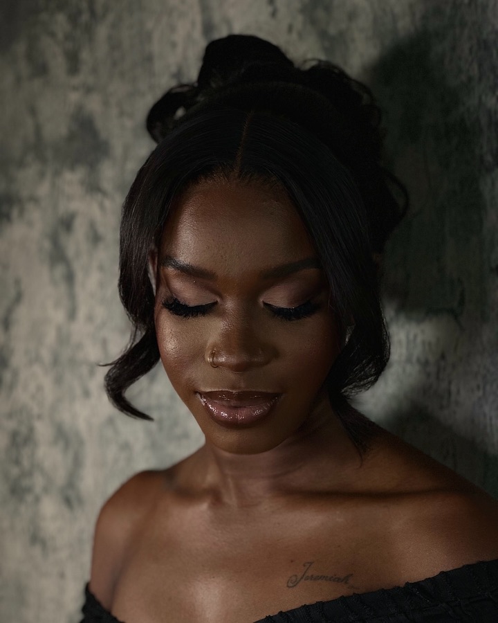 Glam makeup with a sleek updo